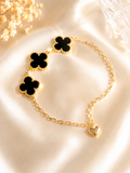 Pulsera Dorada con Tréboles Negros