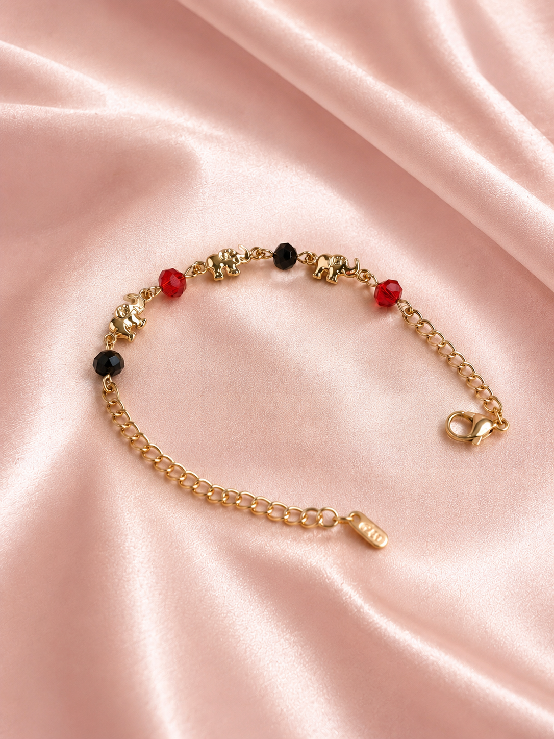 Pulsera de elefante con detalles rojo y negro - Oro laminado 14K